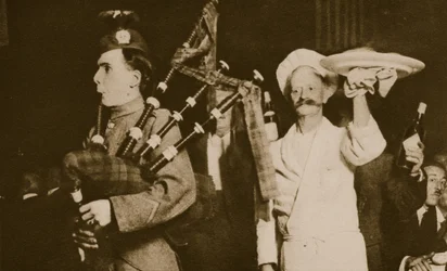 Scottish piper introduces the haggis to a Caledonian Banquet, London